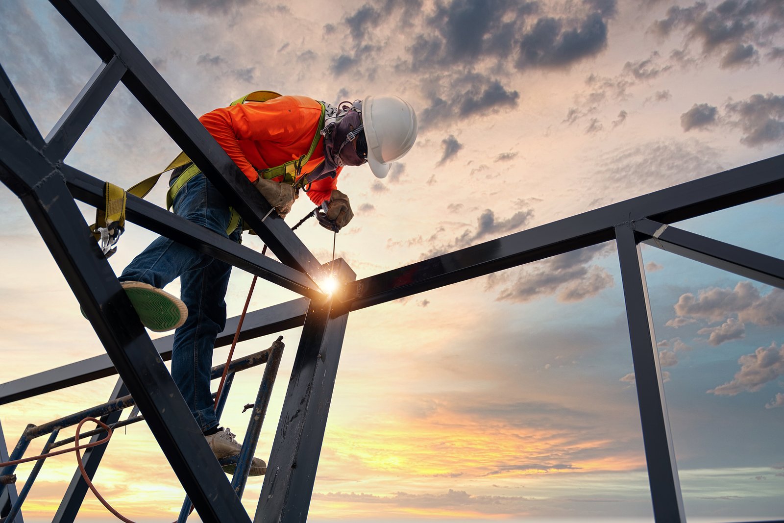 Construction worker on steel building
